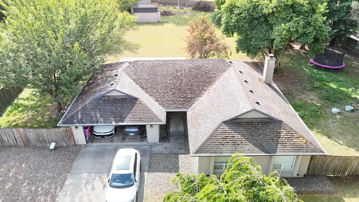 Aerial view of an aging roof on a ranch home in Green Arbor Village, La Center, WA